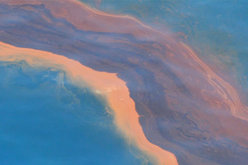 Image of oil floating on water from the Deepwater Horizon spill
