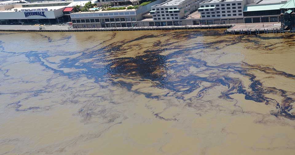 Oil along the New Orleans River Walk following a spill that happened Thursday, April 12, 2018. Image credit: U.S. Coast Guard.
