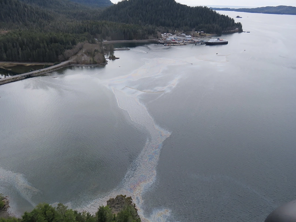 Oil sheen, containment boom, and deflection boom in Starrigavan Bay on April 23, 2017 (USCG)