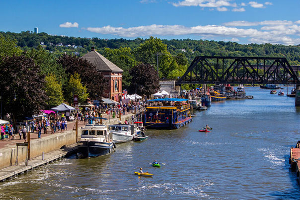 An image showing the Erie Canal at Waterford, New York during a festival. Credit: Erie Canalway National Heritage Corridor/Halldor K. Sigurdsson.