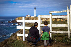 visitors look out at California's historic Point Arena Lighthouse, which sits near the new northern boundary of the expanded Gulf of the Farallones National Marine Sanctuary