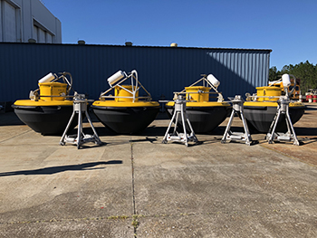 Line of tsunami buoys ready for deployment at the NDBC facility in Mississippi.  Building a sustainable national network of buoys and underwater moorings is the goal of the Strategy for a National Moorings Network, released by U.S. IOOS and NDBC in 2017.  Credit: Victoria Kromer