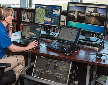 Operating Aurora Centaur optionally-piloted aircraft from console.  Credit: NOAA