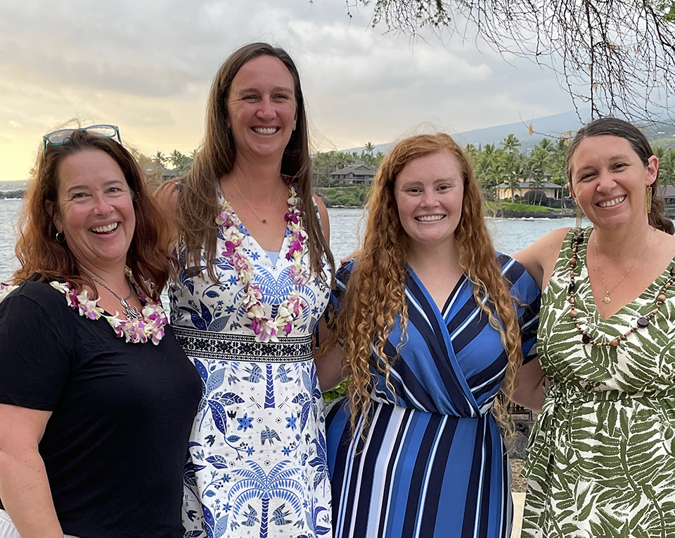 Four women at the task force meeting in Hawaii.