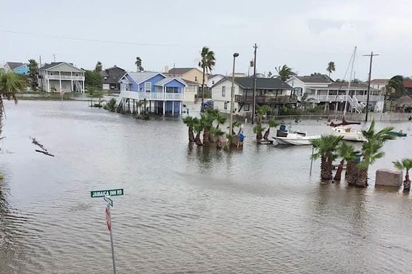 Persistently elevated water levels cause high tide street flooding on Galveston Island, Texas, in June 2020. Credit: Sheri Cortez