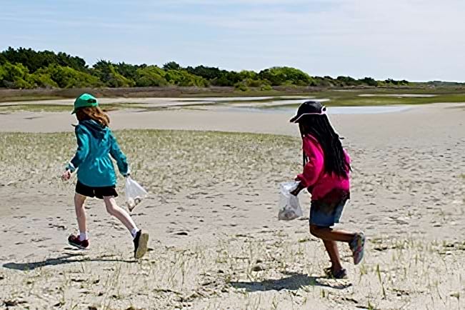 kids running at North Carolina National Estuarine Research Reserve