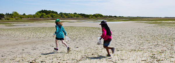 kids running at North Carolina National Estuarine Research Reserve
