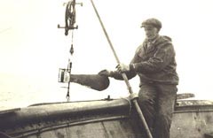 Oceanographer deploying current meter in 1920's.