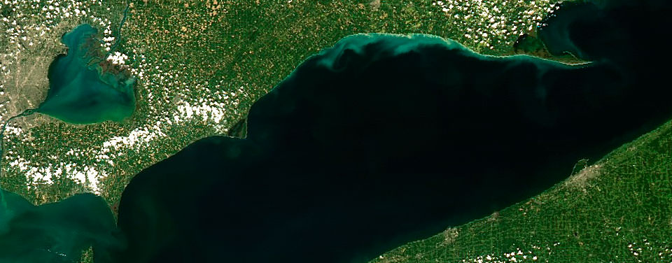 Satellite image of Lake Erie showing a mild harmful algal blom in the southwestern portion of the lake