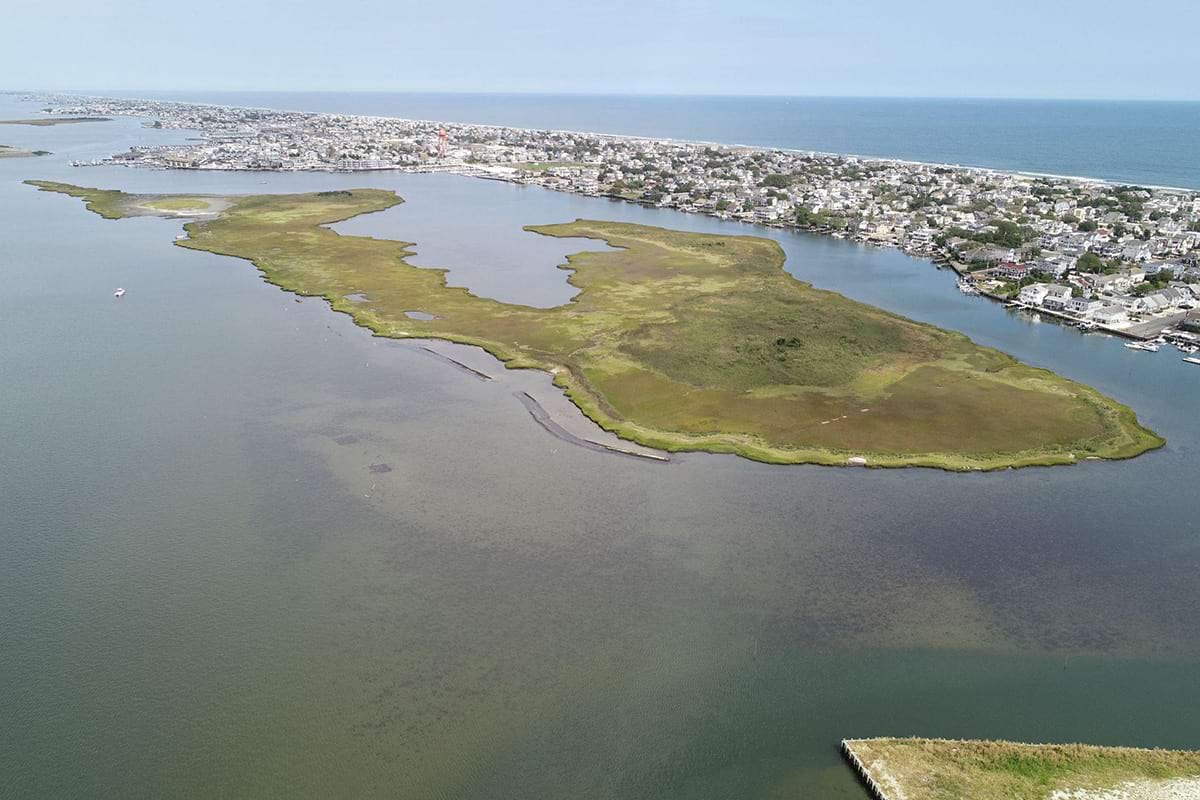 Mordecai Island, New Jersey, protects the Back Bay areas of Long Beach Island. In 2015, part of the salt marsh island was restored with dredged material and planted with native vegetation. (Photo credit: R. Giannelli, NOAA NCCOS)