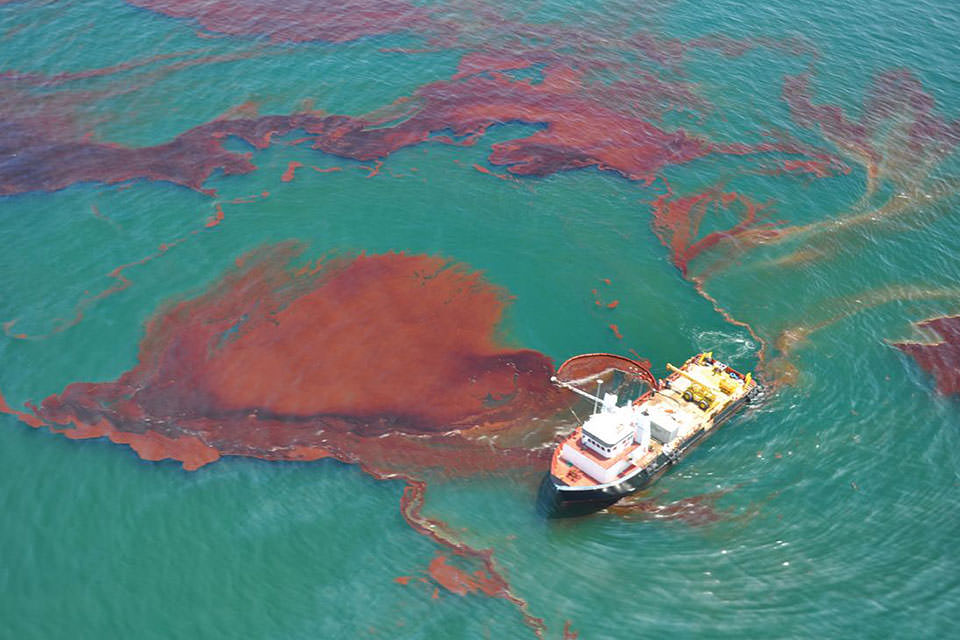 A vessel of opportunity skims oil spilled after the Deepwater Horizon well blowout in the Gulf of Mexico in April 2010.