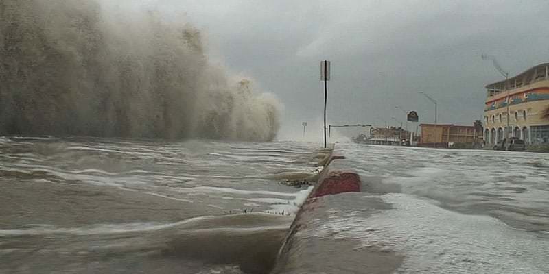 storm surge striking coastal area