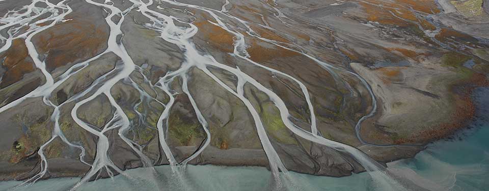 Braided river delta at low tide Lower Cook Inlet Kachemak Bay Alaska.