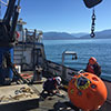A NOAA field crew prepares a current meter mooring for deployment in Puget Sound, Washington.