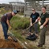 Volunteers help with clean-up and repairs on November 16, 2017, at Mission-Aransas National Estuarine Research Reserve in Texas in the aftermath of Hurricane Harvey.