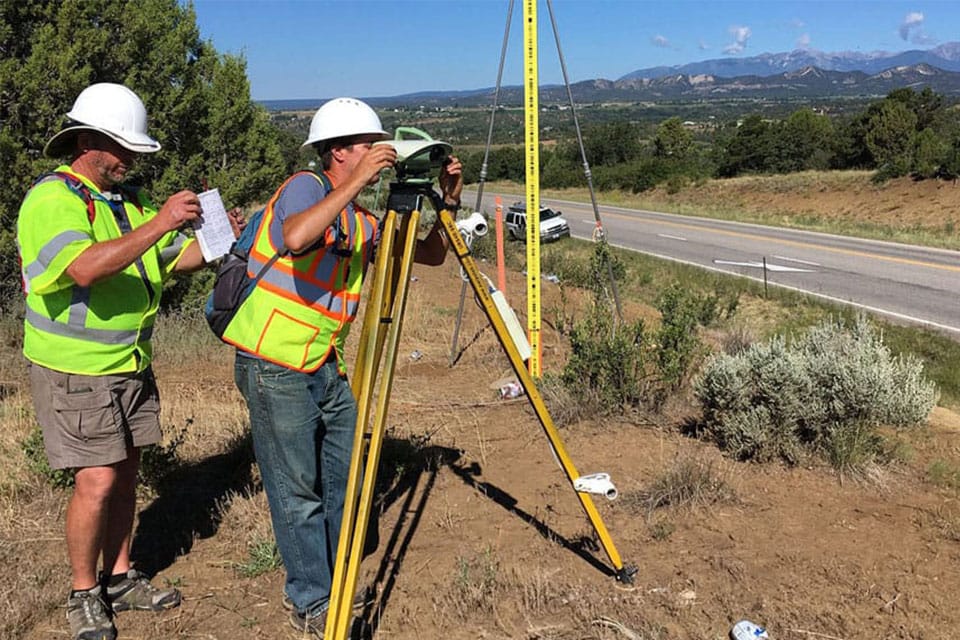 NOAA surveyors Charles Geoghegan and Benjamin Erickson conducting a geodetic surveying project in Colorado, 2017