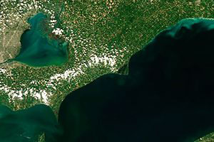 Satellite image of Lake Erie showing a mild harmful algal blom in the southwestern portion of the lake