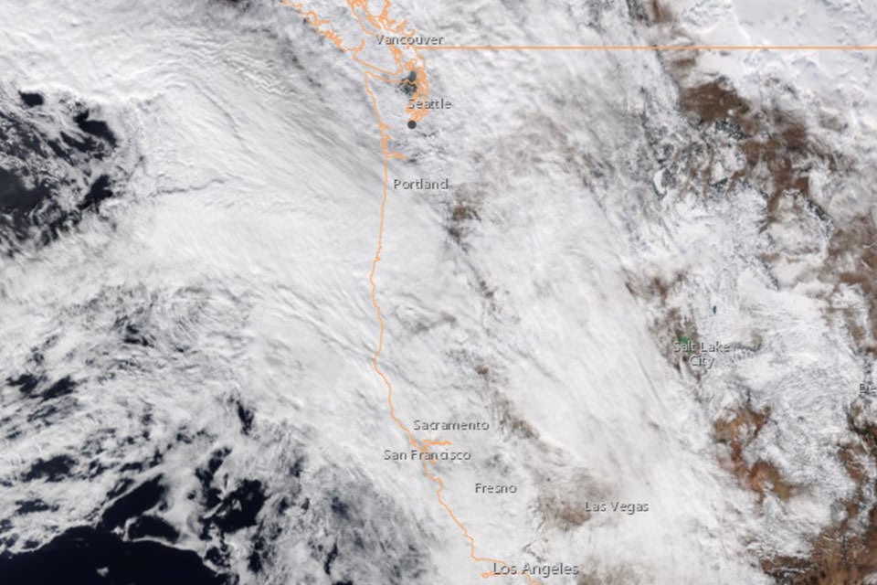 a sattelite view of the Pacific Northwest showing an intense winter storm and cloud cover on December 29, 2022