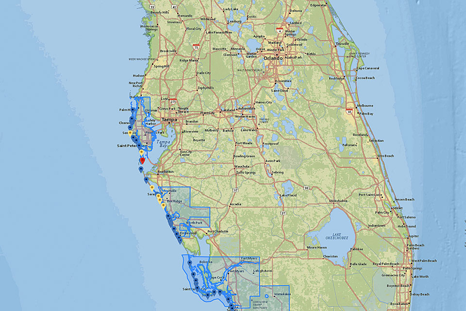 A screenshot of a map showing central Florida with respiratory conditions at beaches on the Gulf of Mexico coast indicated by blue, yellow, orange, and red in order of increasing respiratory risk