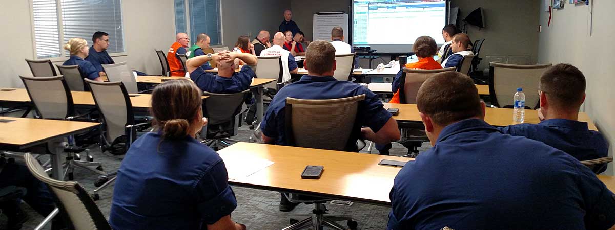 Coast Guard Sector Mobile participates in training exercise. Here, shown in a room of the Disaster Response Center.