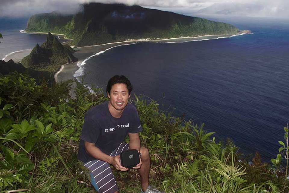 Hideyo Hattori atop a mountain in American Samoa