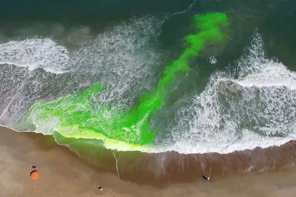 Rip currents are powerful, channeled currents of water that can move at speeds of up to eight feet per second, and can occur at any beach with breaking waves. This image shows a rip current using a harmless green dye.