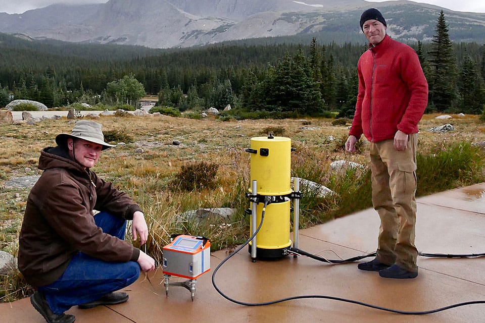Jeff Kanney (left) and Derek van Westrum prepare to calibrate gravity meters in the high altitudes west of Boulder. Gravity and height are critical to mapping where water will flow.