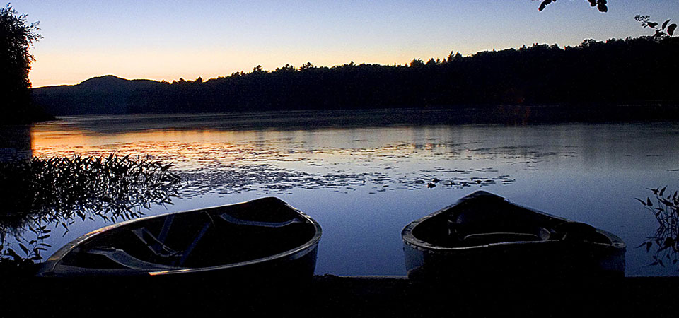 canoes on the shore; image credit: NY Department of Environmental Conservation