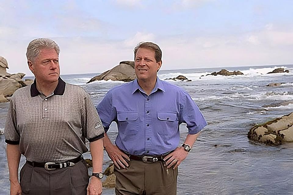 President Clinton and Vice President Gore walk on the beach of Monterey Bay National Marine Sanctuary in 1998