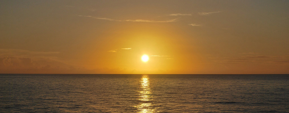 Sunset over the Caribbean Sea. Credit: Julie Malick